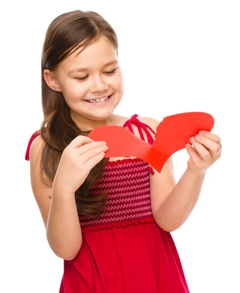 Portrait of a happy little girl in red — Stock Photo, Image