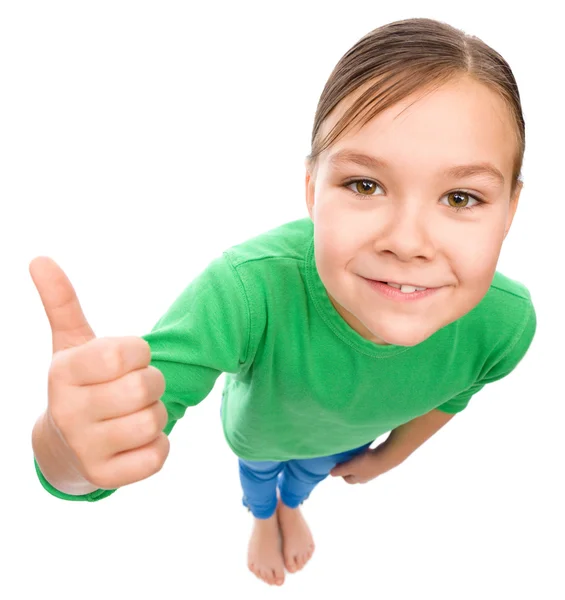Kleines Mädchen zeigt Daumen-hoch-Geste — Stockfoto