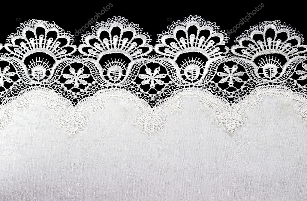 white lace on black background