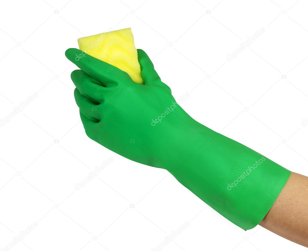 Hand in green glove with sponge