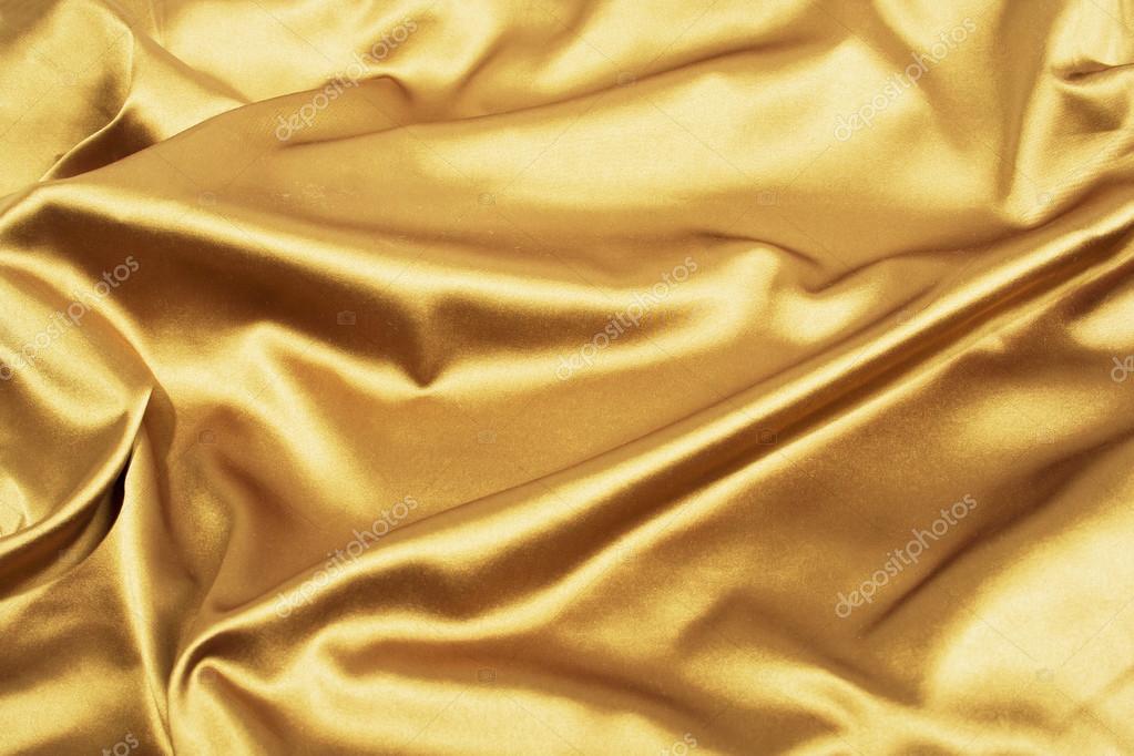 Golden satin or silk background, luxury elegant Stock Photo by ©deslns  96290684