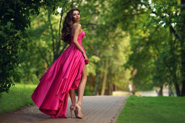 Pretty girl in pink dress Royalty Free Stock Photos
