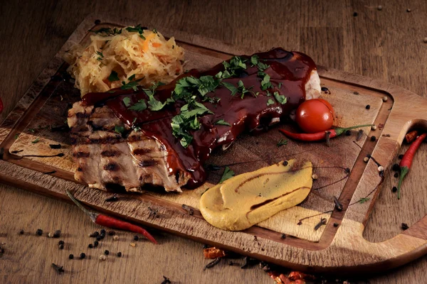 Port steak with red sauce — Stock Photo, Image