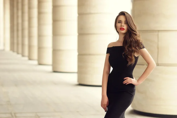 Pretty beautiful business woman in elegant black dress — Stock Photo, Image