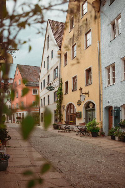 Fssen, Germany 26 May 2019 - Old european streets with small cozy cafes and small shops