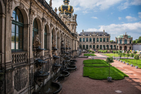 17 May 2019 Dresden, Germany -  The Zwinger, baroque palace in Dresden, Germany. Langgalerie details - decorative fountains and sculptures