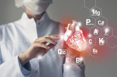 Kalp sağlığı için temel besin maddeleri Q10, Kalsiyum, Magnezyum, Doktorun fosforlu portresi.