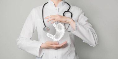 Mide sorunları tıbbi konsept. Kadın doktorun fotoğrafı, boş alan.. 