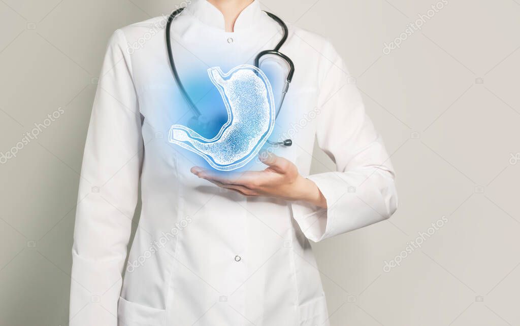 Stomach issues medical concept. Photo of female doctor, empty space. 