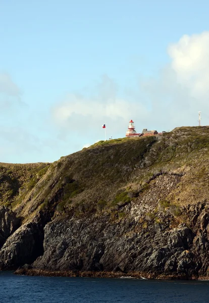 Kända fyren vid Cape Horn - den sydligaste punkten på ögruppen Tierra del Fuego — Stockfoto