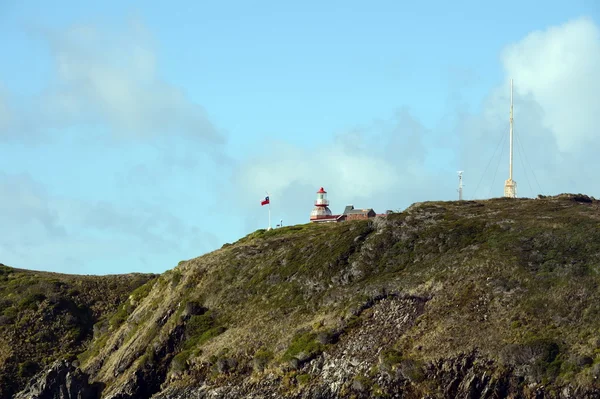 Kända fyren vid Cape Horn - den sydligaste punkten på ögruppen Tierra del Fuego — Stockfoto