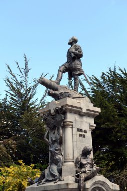  A monument to Fernando Magellan in Punta arenas.  clipart