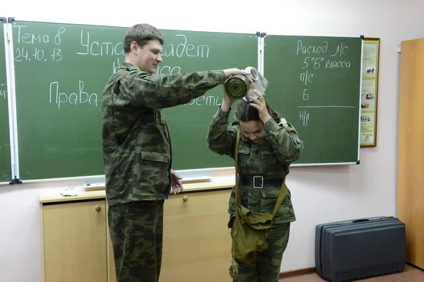 Training putting on the gas mask — Stock Photo, Image