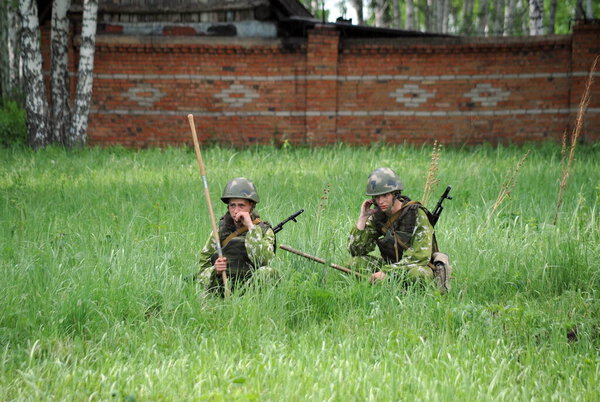 JURGA, SIBERIA, RUSSIA - JUNE 6,2011:Sappers on the minefield waiting for the signal