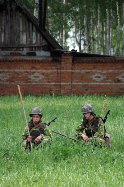 JURGA, SIBERIA, RUSSIA - JUNE 6,2011:Sappers on the minefield waiting for the signal