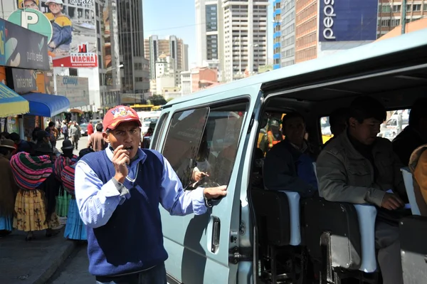 In public transport La Paz barkers who are shouting a bus route. — Stock Photo, Image