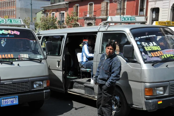 In public transport La Paz barkers who are shouting a bus route. — Stock Photo, Image