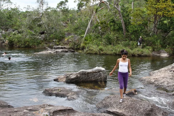 Tourists on a mountain river Canio Cristales. — Stock Photo, Image