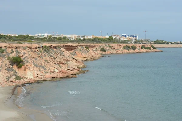 Punta prima es la parte más meridional de la popular localidad de Torrevieja, es reconocida como la región más limpia ecológicamente de Europa, conocidas playas limpias . — Foto de Stock