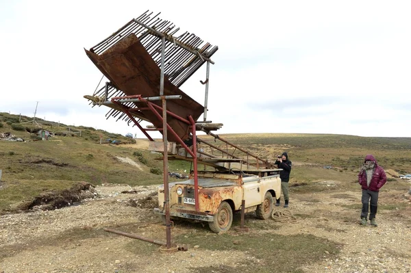 Gold Digger Shows Tourists Alluvial Gold Sand Mined In The Mine On