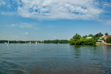 Embankment of the Klyazmensky reservoir, river walk along the Moscow water channel, Russia