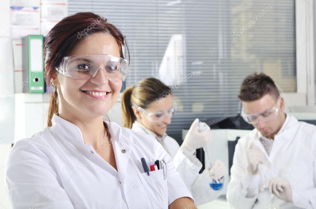 Attractive young PhD student scientist  in laboratory