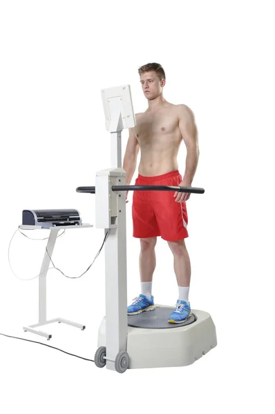 Sportsman doing Balance Assessment with Professional Equipment. — Stock Photo, Image