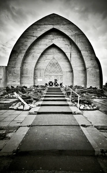 Modern church made of concrete in scary scene — Stock Photo, Image