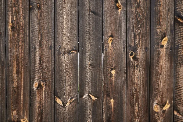 Old brown surface of nature pattern of wooden decorative wall texture surface with knots in details. — Stock Photo, Image