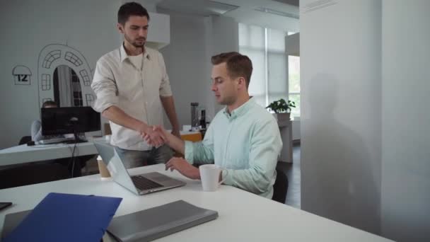 Coworkers get together before meeting in the morning. — Stock Video