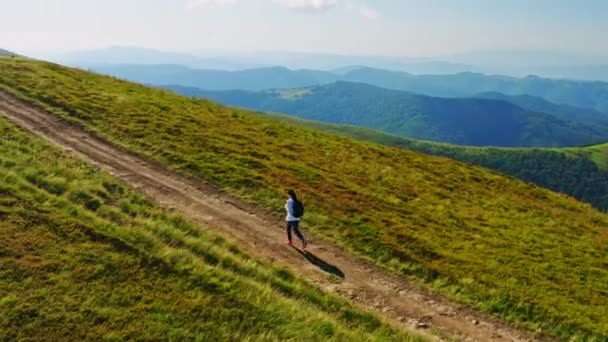 Drone fly above female hiker — Vídeo de Stock