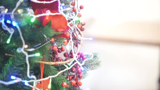 Christmas tree decorated with garlands and toys — Stock Footage Christmas tree decorated with garlands and toys Royalty Free Stock Video