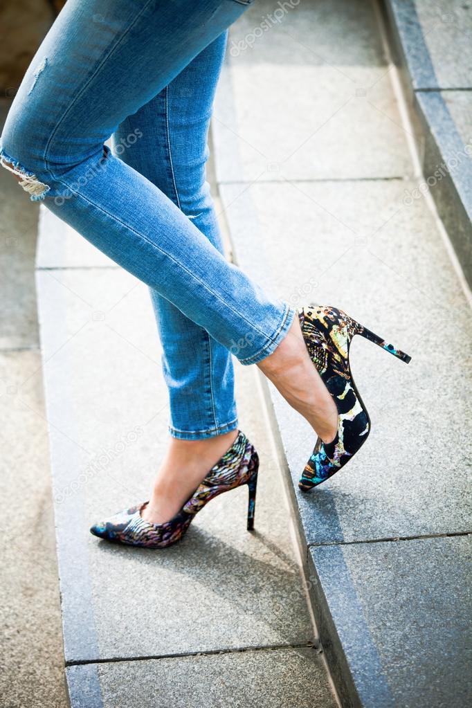 High heel shoes and blue jeans — Stock Photo © cokacoka