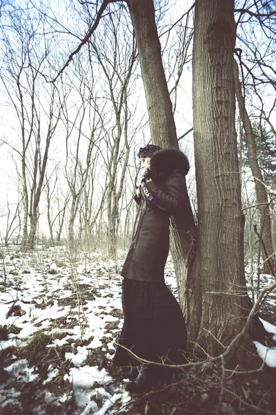 Fashion in winter wood — Stock Photo, Image