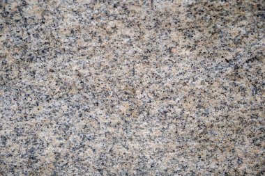 Pürüzsüz gri bir taş levhanın mermer deseni, doğal kesilmiş ve parlatılmış taş.           