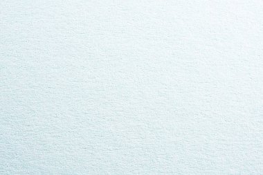 Arka planda sağlam bir yapısı olan renkli kağıt, stüdyoda çekilmiş.