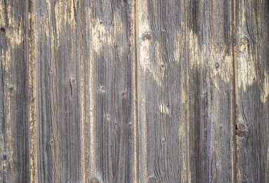 Ahşap arka plan olarak iyi bir kırsal yapı, gün ışığında fotoğraflanmış.                