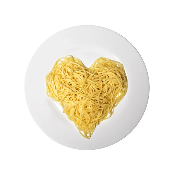 Spaghetti en forme de coeur sur une assiette — Photo