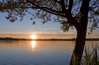 Sunset at a small lake near Lake Constance clipart