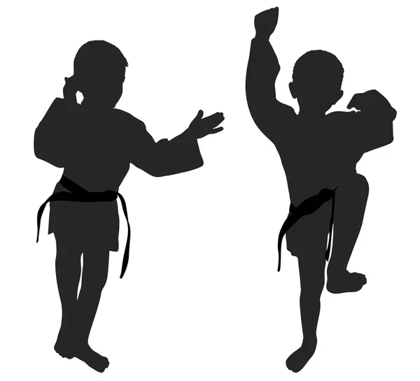 Siluetas de dos niños pequeños — Vector de stock