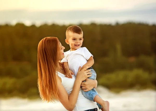 Happy mother and son in the mountains playing — Stock Photo, Image