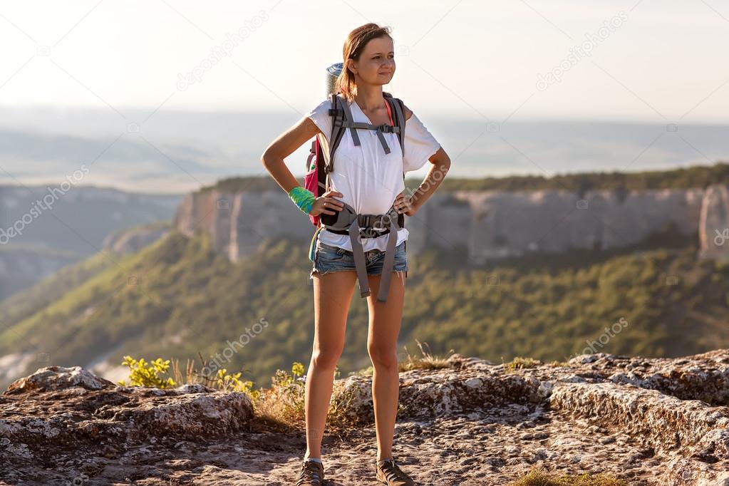 girl tourist in mountains