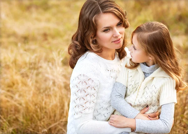 Young mother and her toddler girl have fun, mother's Day. — Stock Photo, Image