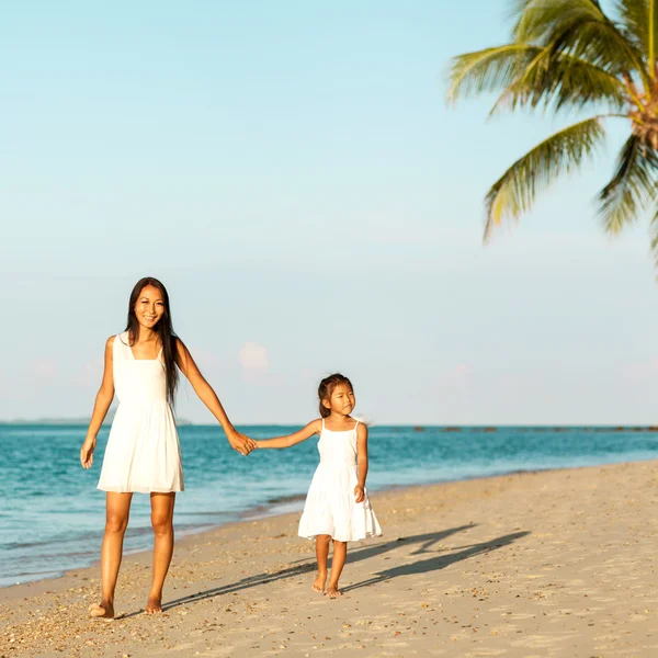 mother and daughter happy in love at sunset