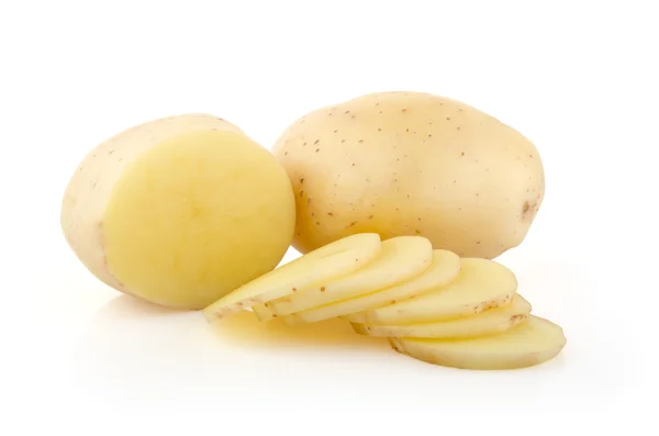 Patate e fette su bianco — Foto Stock