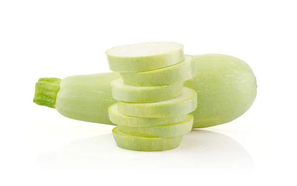 Fresh vegetable marrow and slices on white — Stock Photo, Image