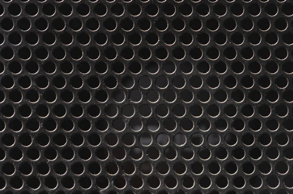 Speaker grill texture is black with dust particles — Stock Photo, Image