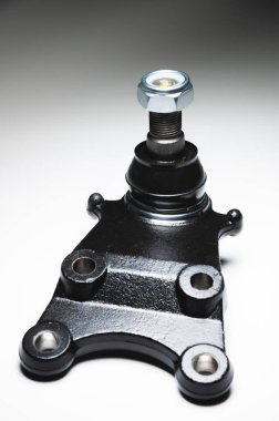 off-road Ball ortak araba süspansiyonu gri arka planda. Yeni yedek parçalar axel araba elementleri