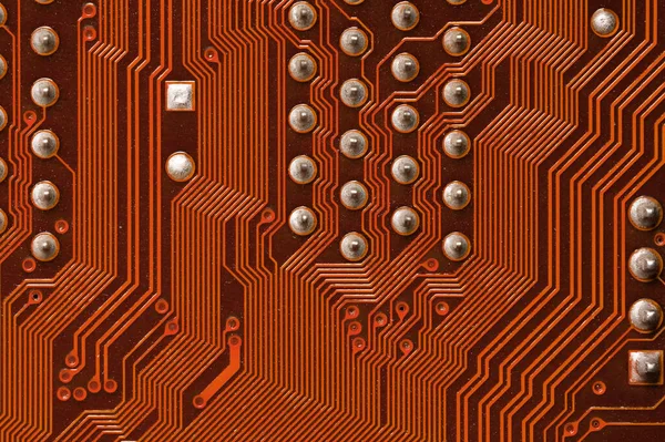 Placa de circuito informático de cerca. Antecedentes del tema de la electrónica y la informatización —  Fotos de Stock