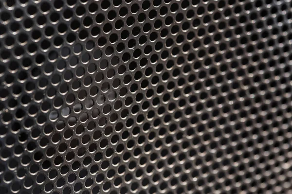 Hoparlör ızgara dokusu toz parçacıklarıyla siyahtır